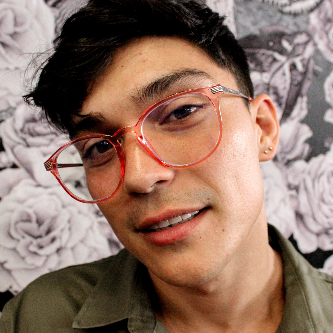 Love Child Pink Round Blue Light Glasses on a male model