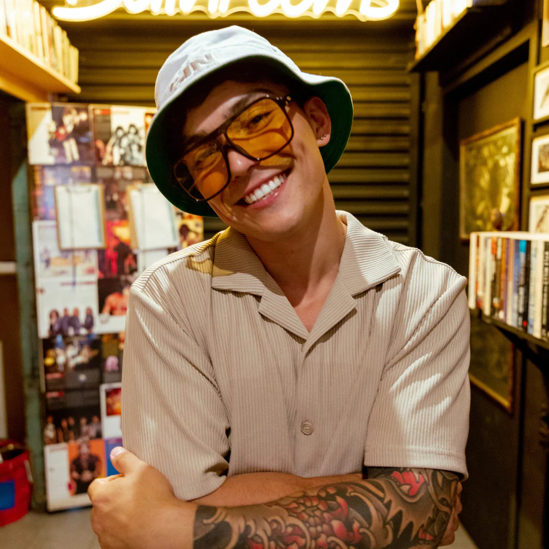 SIN Bat Country White Bucket Hat on a male model