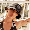 SIN Sun Chasers Black Bucket Hat on a female model