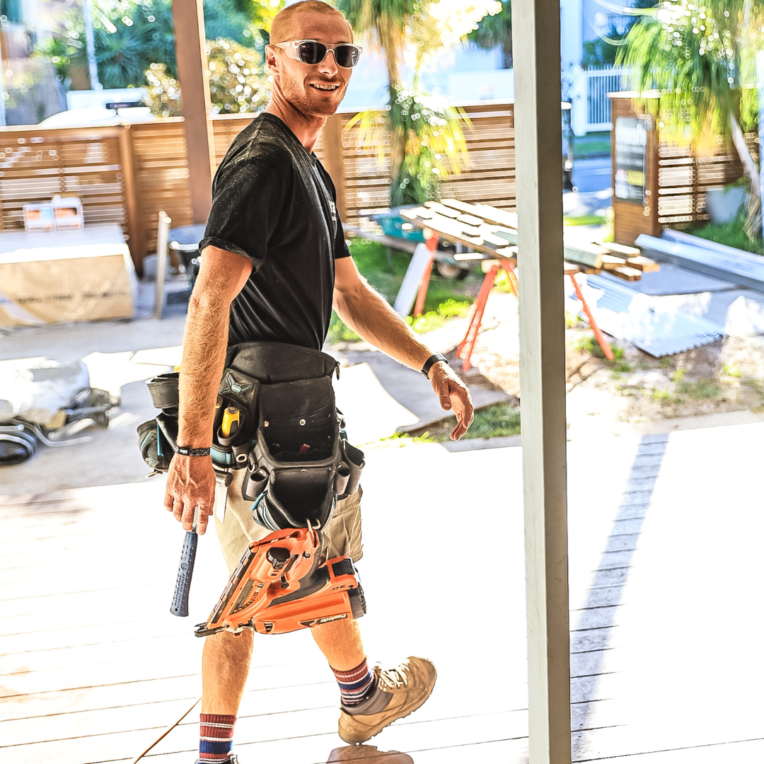 Safe & Sound Clear Wrap Around Medium Impact Resistant Safety Sunglasses side view on a Male Tradie wearing a tool belt