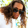 The Game Changer Polarised Green Square Sunglasses on a male model