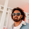 The Game Changer Polarised Grey Square Sunglasses on a male model