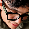 Topshelf Black Square Blue Light Glasses close up on a male model