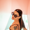 Topshelf Polarised Brown Square Sunglasses on a female model